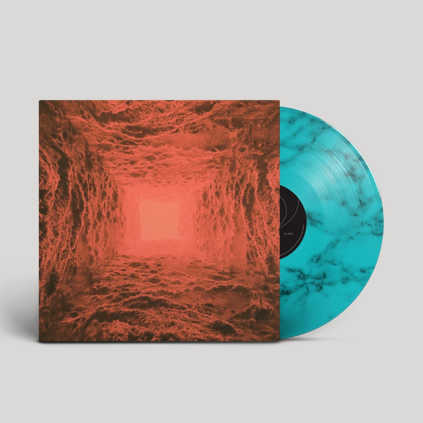 Vinyl record with marbled blue coloring and textured red cover art.