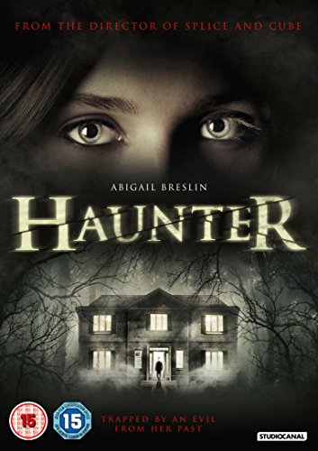 DVD cover for Haunter featuring a woman's eyes above a dark, foggy house.
