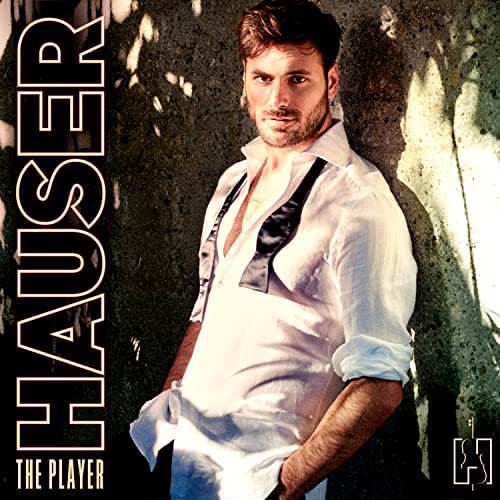 Hauser album cover featuring a man in a white shirt, leaning against a wall.