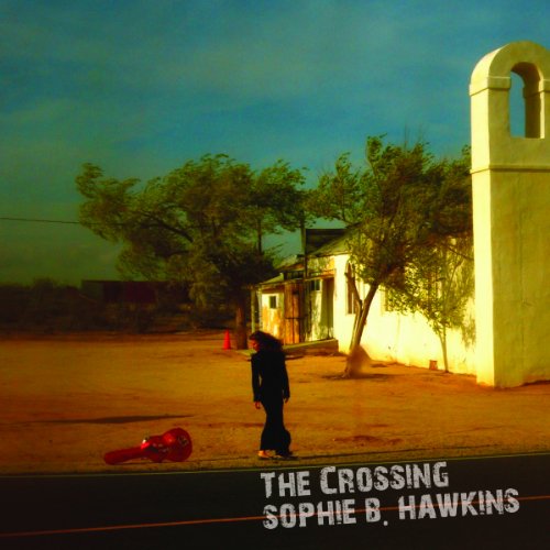 CD cover: woman standing near buildings and a broken guitar.
