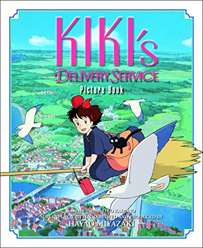 Kiki flying on a broomstick with her black cat over a coastal town.
