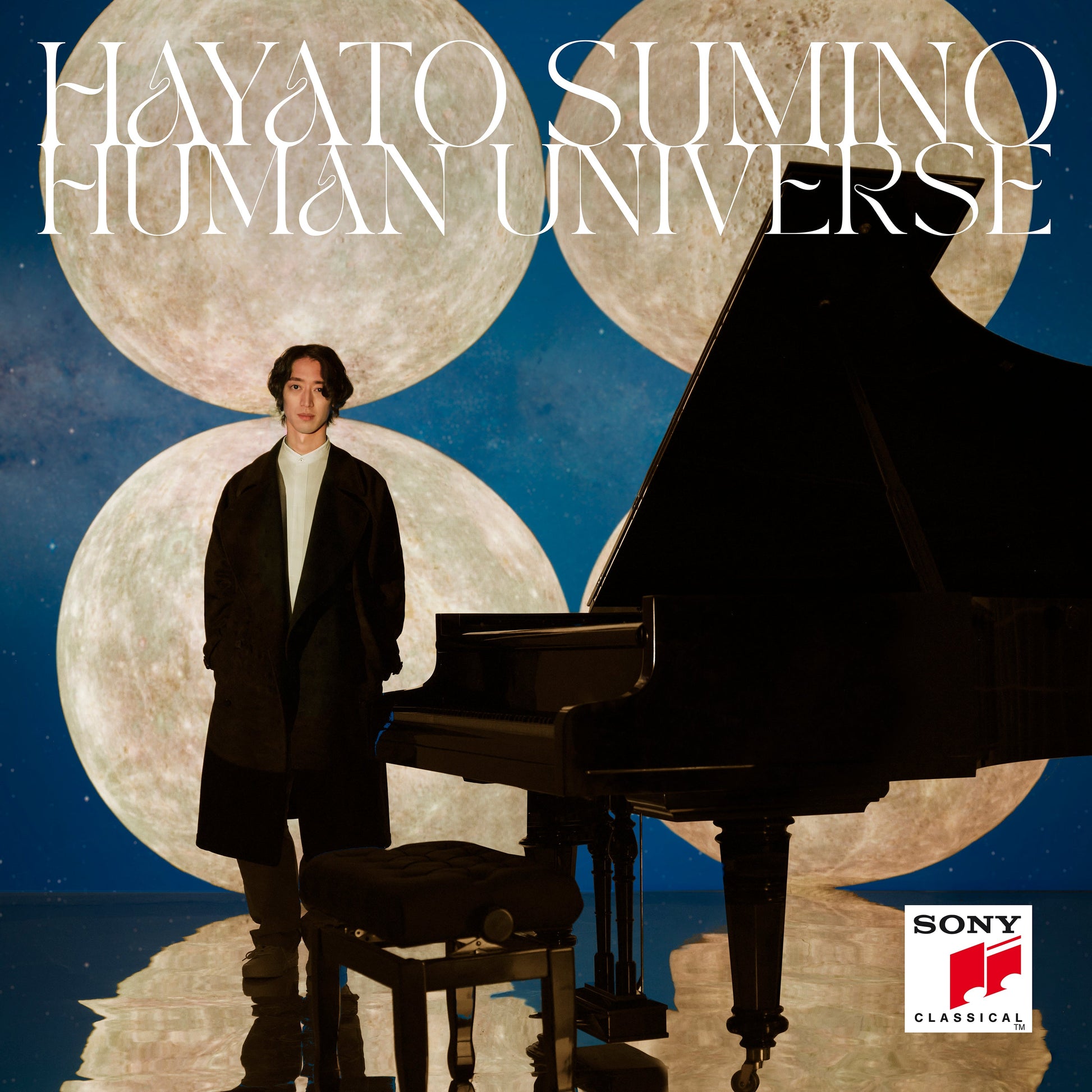Hayato Sumino album cover: pianist with moons and a grand piano.