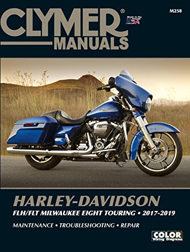 Clymer repair manual cover featuring a blue Harley-Davidson motorcycle.