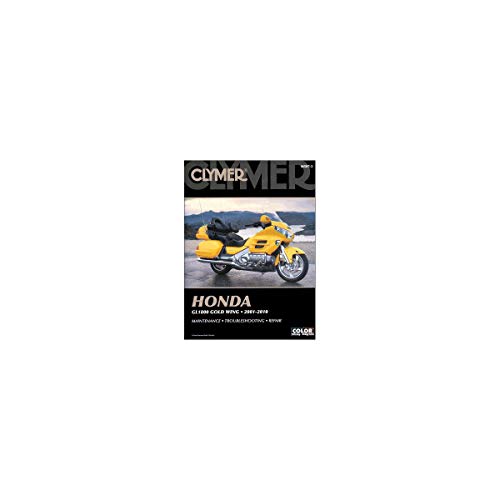 Clymer repair manual cover featuring a yellow Honda Gold Wing motorcycle.