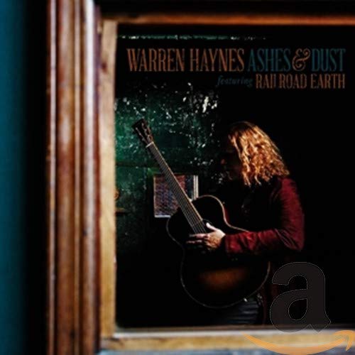 Warren Haynes album cover featuring a guitarist in a doorway.