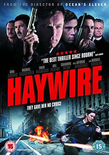 Haywire DVD cover featuring action scene and cast portraits with guns.