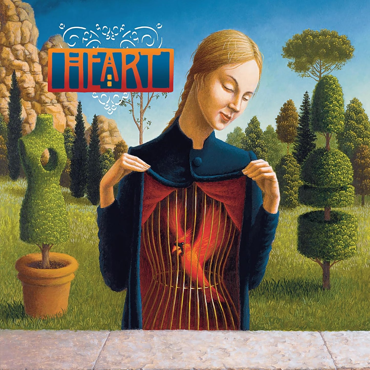 Heart's "Greatest Hits" vinyl cover: woman in a garden, holding her coat.