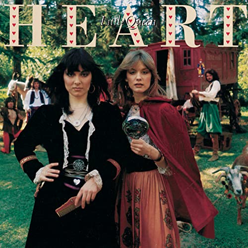 Album cover for Heart’s “Little Queen” featuring two women and a caravan.
