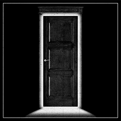 A black door centered in a dark frame with light glowing from the edges.