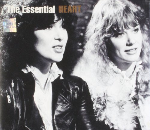 Black and white photo of two women, one with dark hair and leather jacket.