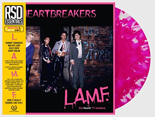 Record album cover featuring four men and pink & white vinyl.