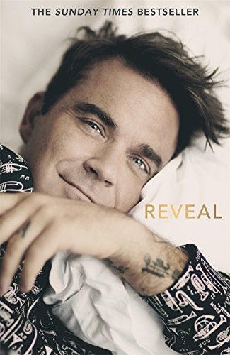 Book cover featuring Robbie Williams smiling and lying on a pillow.