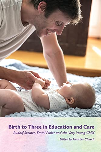Adult interacting with baby on a blue blanket, book cover shown below.