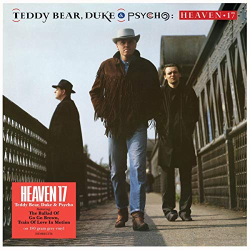 Heaven 17 album cover: three men in coats on a bridge.