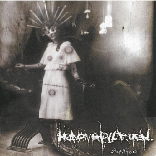 Dark, grainy album cover featuring a figure in a spiked crown and white dress.