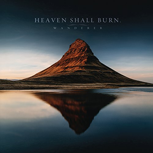 Mountain reflected in water under a dramatic sky, titled "Heaven Shall Burn - Wanderer".