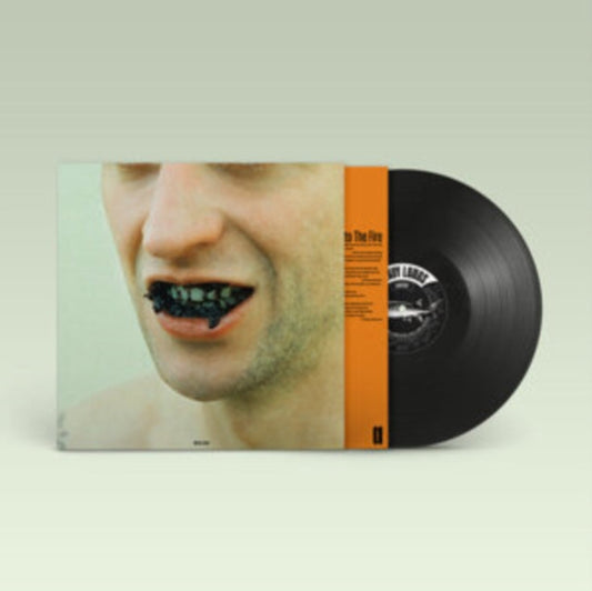 Album cover with a man’s face and black caviar in his mouth, vinyl record.