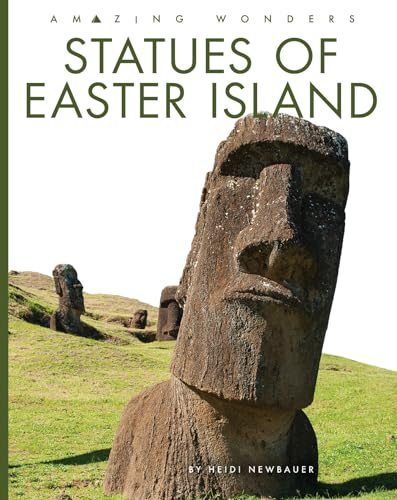 Close-up of a Moai statue on Easter Island, with others in the distance.