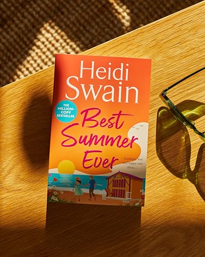 Book cover for Best Summer Ever by Heidi Swain on a wooden table.