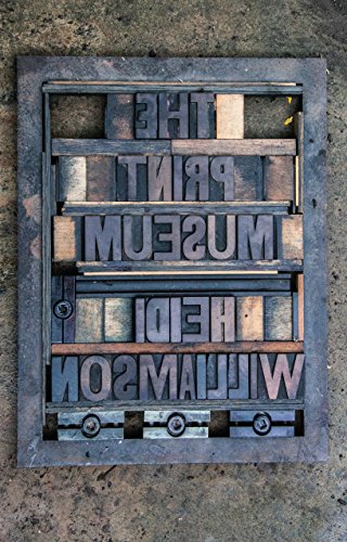 Vintage metal letterpress type arranged to spell “The Print Museum.”