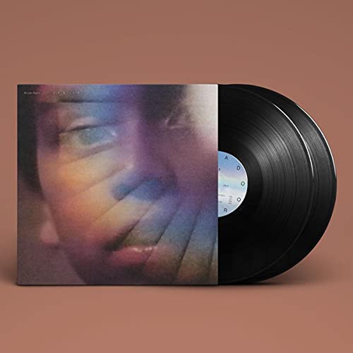 Helado Negro's "Far In" vinyl record with a blurred portrait cover.