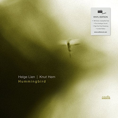 Vinyl record cover: blurred hummingbird image with album title "Hummingbird".