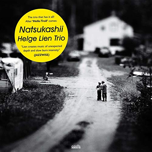 CD cover for Helge Lien Trio’s “Natsukashii” with a rural landscape.