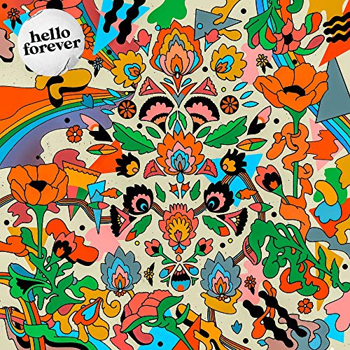 "Two vinyl records with colorful album covers, one floral and one with a family photo."