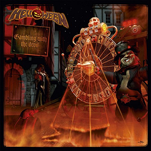 Helloween album cover: a devilish carnival wheel with figures and flames.