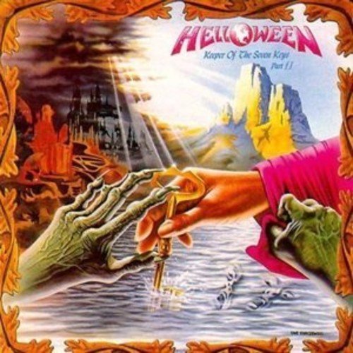 Helloween album cover: skeletal hand reaching for a key with a castle backdrop.