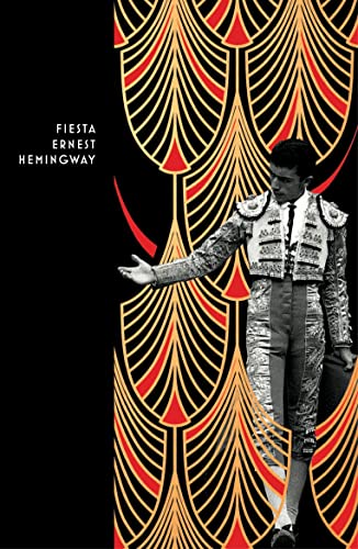 Book cover: "Fiesta" by Hemingway, featuring a matador and art deco design.