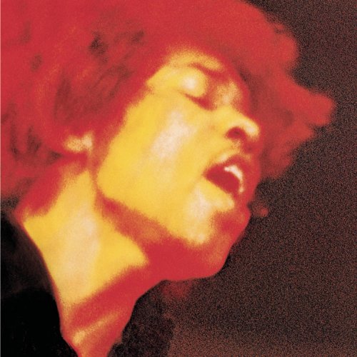 Close-up of Jimi Hendrix with reddish-orange tones, eyes closed, singing.