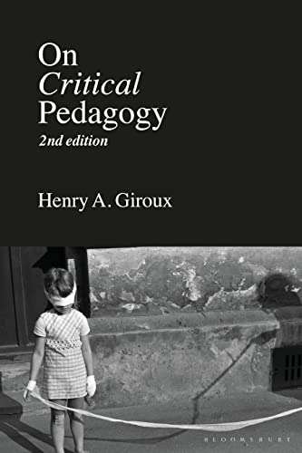 Book cover with white text on black background and a child wearing a blindfold.
