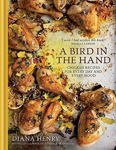 Cookbook cover featuring roasted chicken pieces with lemon and herbs.