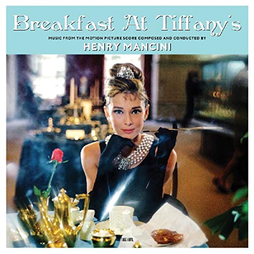 Album cover for "Breakfast at Tiffany's" soundtrack featuring Audrey Hepburn.