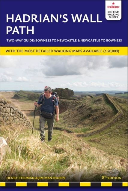 Hadrian’s Wall Path guidebook cover with a hiker on the wall.