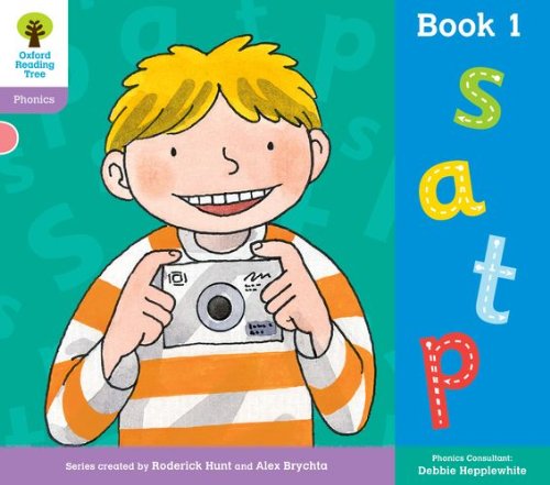 Book cover with a smiling boy holding a camera and large letters.