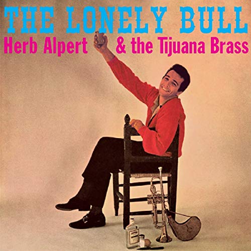 "Herb Alpert sitting on chair with trumpet, text 'The Lonely Bull' above."