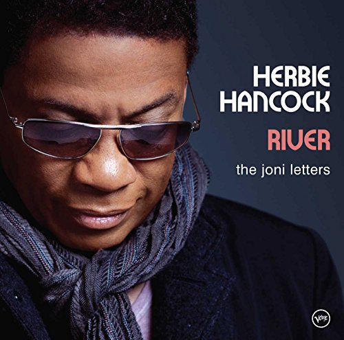 Herbie Hancock wearing sunglasses and a scarf, with album title text on the right.