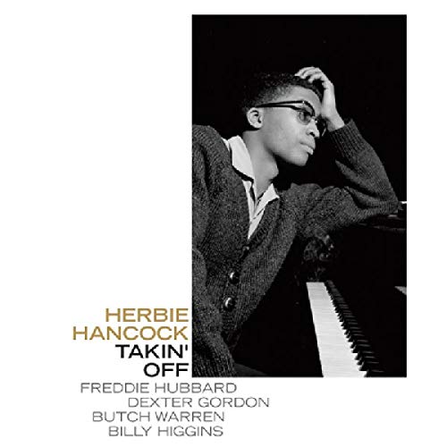 CD case with Herbie Hancock's name and Takin Off title, jazz musician portrait possibly included.