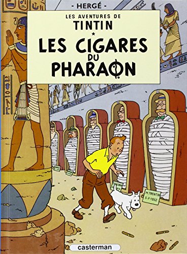 Tintin comic book cover, “Les Cigares du Pharaon,” featuring mummies and Tintin.