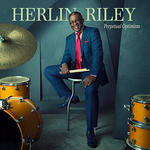 Herlin Riley album cover featuring the drummer in a blue suit.