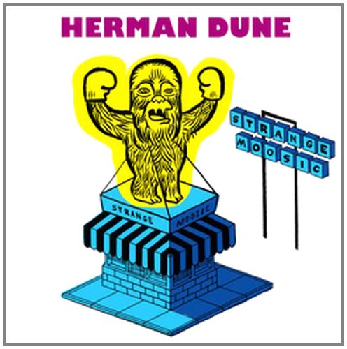 CD cover: yellow gorilla figure on a blue, tiered structure.