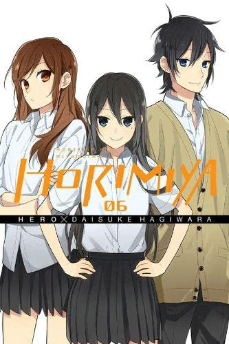 Three anime-style characters stand together on the cover of Horimiya volume 6.