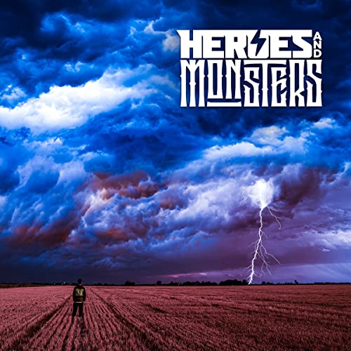 CD cover: stormy sky, golden field, lone figure, bold text "Heroes And Monsters".