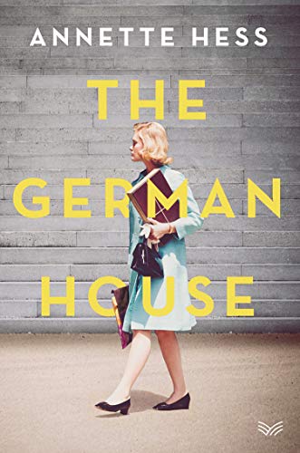 Book cover: woman in blue coat walking, grey brick wall backdrop.