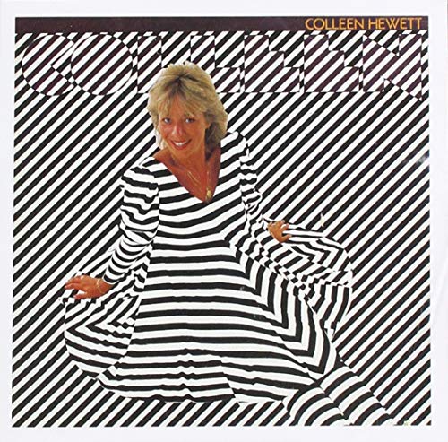 CD cover: Colleen Hewett poses against a black and white striped background.