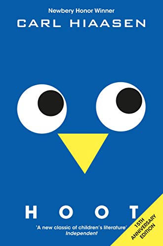 Book cover for "Hoot" featuring large, stylized owl eyes on blue.