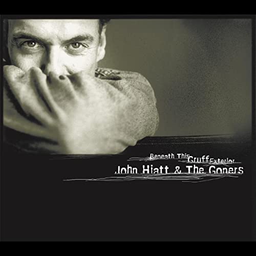 Black and white portrait of John Hiatt, album cover for "Beneath This Gruff Exterior.