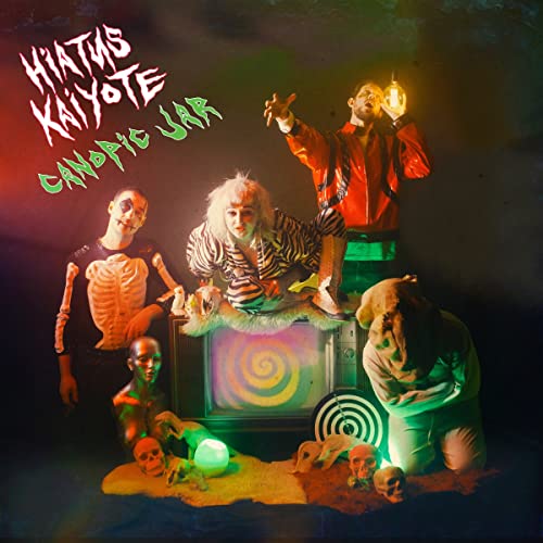 Hiatus Kaiyote album cover: four figures with a vintage television.